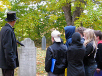 Students touring a cemetery