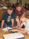 Students scanning an item